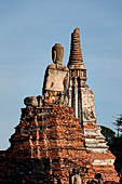 Ayutthaya, Thailand. Wat Chaiwatthanaram, the east rectangular platform of the old ubosot faces the river with  a couple of larger seated Buddhas. 